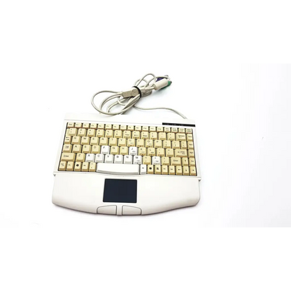 Cream-colored ergonomic solidtek ack-540 usb keyboard with integrated touchpad and coiled gray cable usb keyboard