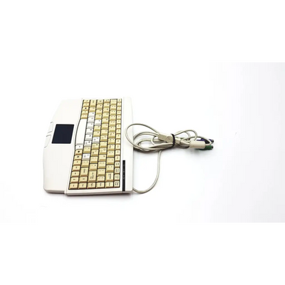 Cream-colored ergonomic solidtek ack-540 usb keyboard with beige keys integrated touchpad and coiled cable usb keyboard