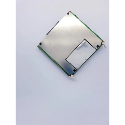 Silver-colored Sony AU-149 board motherboard with green edges and rectangular cutout featuring spacelabs mpc860 cpu