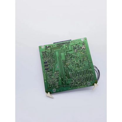 Green rectangular sony au-150 board with intricate copper traces and components for spacelabs mpc860 cpu nibp assembly board
