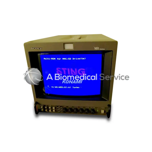Beige sony pvm-20n5u trinitron color video security monitor displaying a blue screen with biomedical service konami text