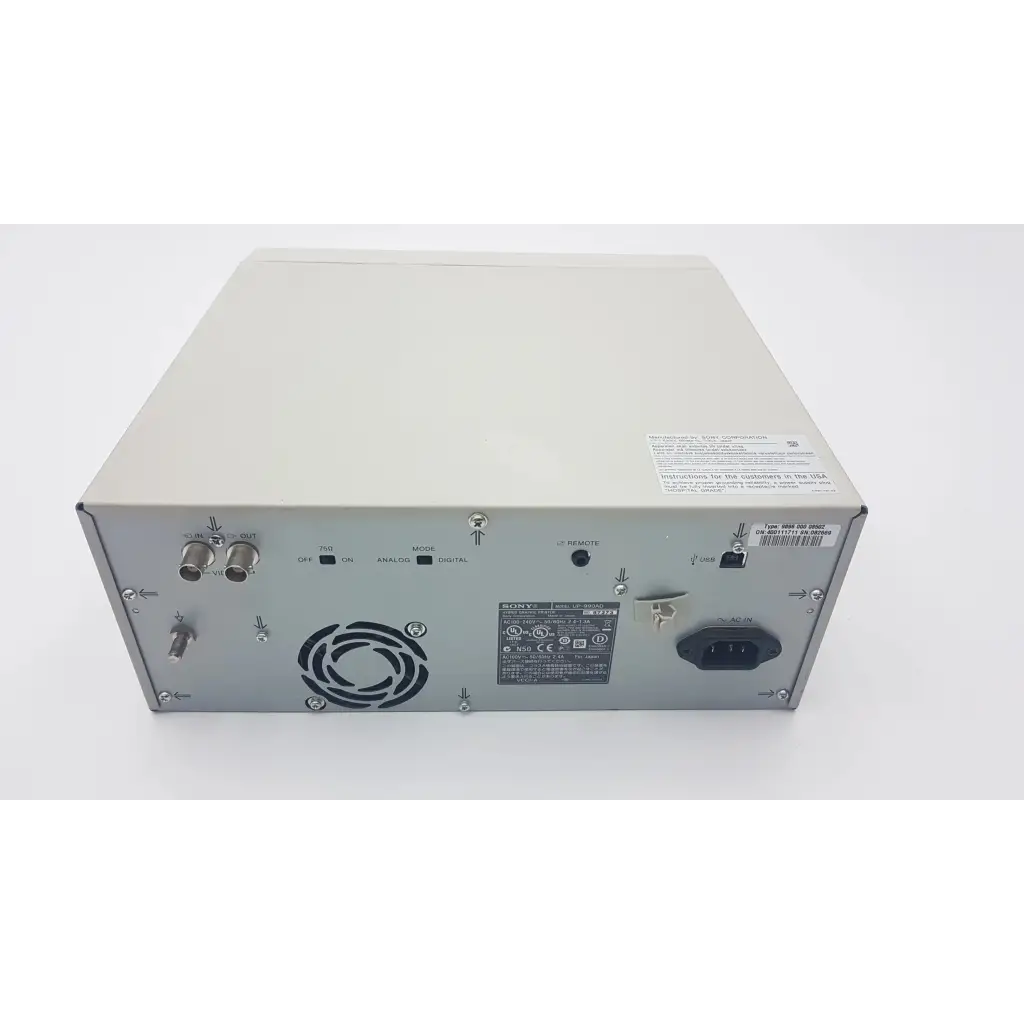 Rear panel of silver sony up-990ad hybrid graphic printer showing multiple input output ports and power connector