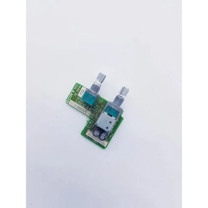 Green sony vr 117 1-640-044-11 board with two silver knobs and blue capacitors featuring spacelabs mpc860 cpu circuitry