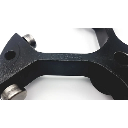 Black metal sorvall heracus tool swinging bucket rotor with textured surface and two silver cylindrical components