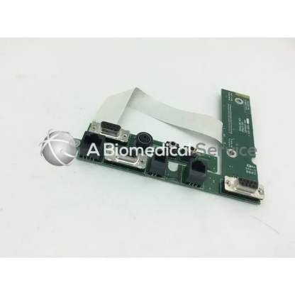 Green circuit board patient monitor data export card with multiple ports for spacelabs 650-0552-00 monitor data export