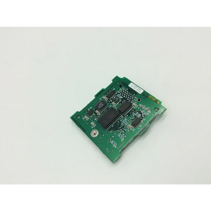 Green rectangular Spacelabs 670-0624-05 controller circuit board with black integrated circuits and silver solder points