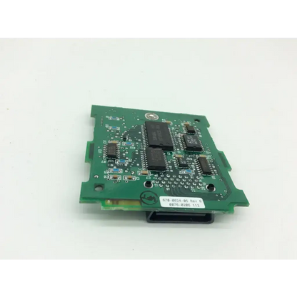 Green printed circuit board with black integrated circuits and silver solder points on spacelabs 670-0624-05 controller