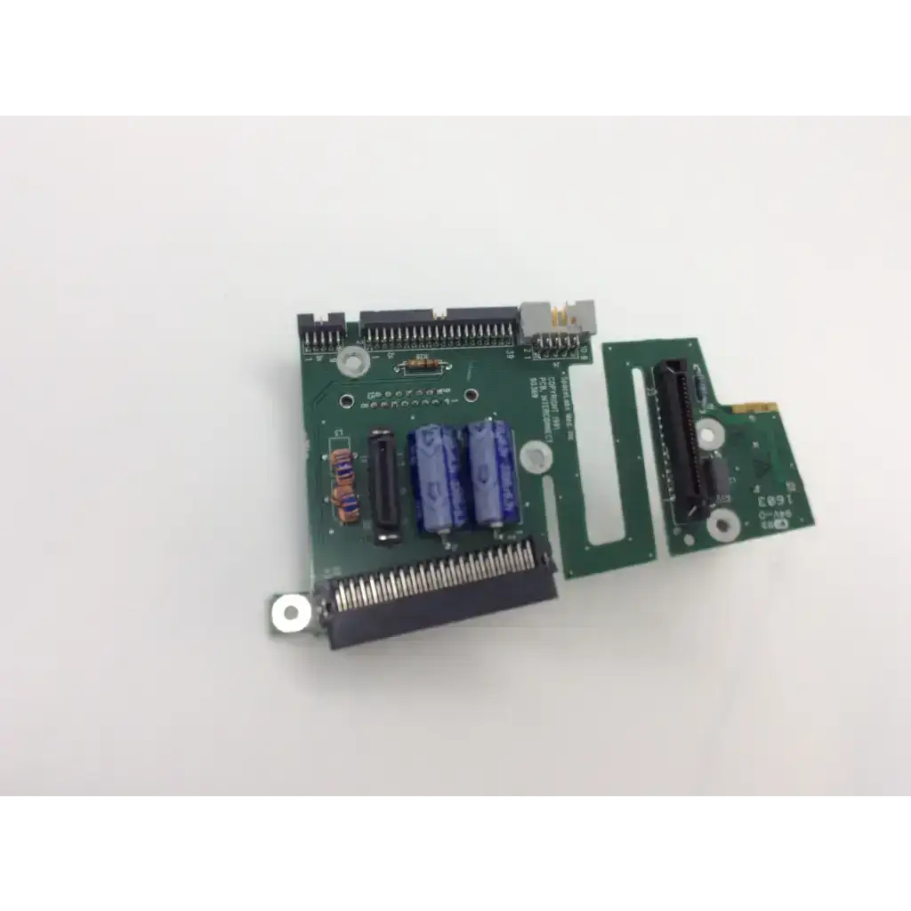 Green pcb assembly interconnect board with blue capacitors and metallic connectors for spacelabs 670-0849-02 rev d