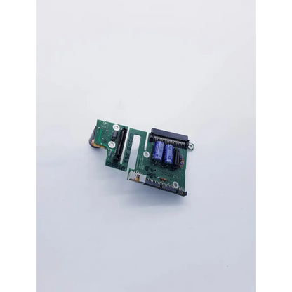 Green circuit board with blue capacitors and black connectors in spacelabs 670-0849-02 rev d pcb assembly interconnect board