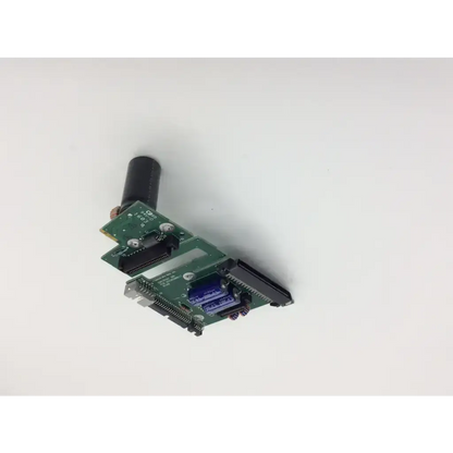 Green pcb assembly interconnect board with black connectors and cylindrical component for spacelabs 670-0849-02 rev d
