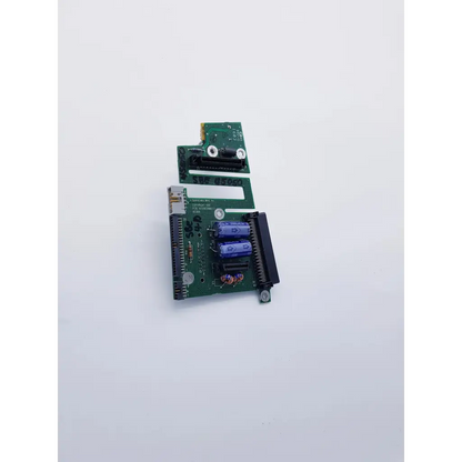 Green pcb assembly interconnect board with blue capacitors and black connectors for spacelabs mpc860 cpu