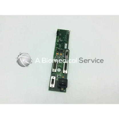 Green rectangular circuit board with multiple connectors and black power switch for spaclabs monitor parts p n 670-1298-00 rev e