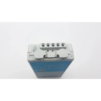 Gray and blue spacelabs 90343-05 ultraview digital telemetry multiparameter transmitter with labeled nibp spo2 ports