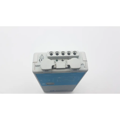 Gray and blue spacelabs 90343-05 ultraview digital telemetry multiparameter transmitter with labeled ports for vital signs