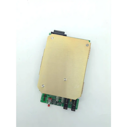Gold-colored metal housing with green pcb assy featuring cpu vcap chk and black connectors in spacelabs healthcare product