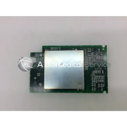 Silver metallic heat sink mounted on green pcb circuit board of spacelabs medical 670-0491-03 rev e product