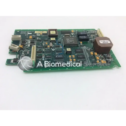 Green pcb circuit board with black integrated circuits and beige connectors from spacelabs medical model 670-0491-03 rev E
