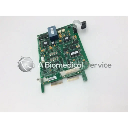Green printed circuit board with black integrated circuits and blue component of spacelabs mpc860 cpu nibp assembly board
