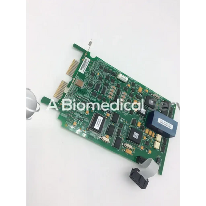 Green circuit board with black integrated circuits and blue component for spacelabs mpc860 cpu nibp assembly board model 0320-0324