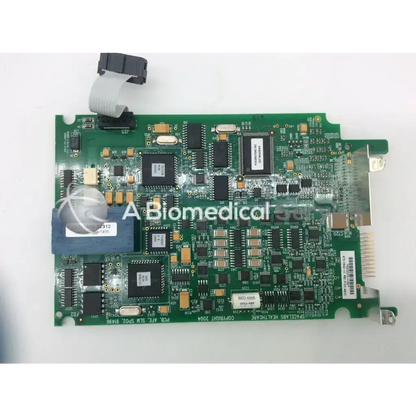 Green circuit board with black and silver components labeled spacelabs healthcare for spacelabs mpc860 cpu nibp assembly board