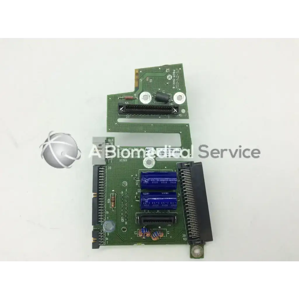 Green circuit board with blue capacitors and black connectors on spacelabs ultraview sl patient interconnect board pcb
