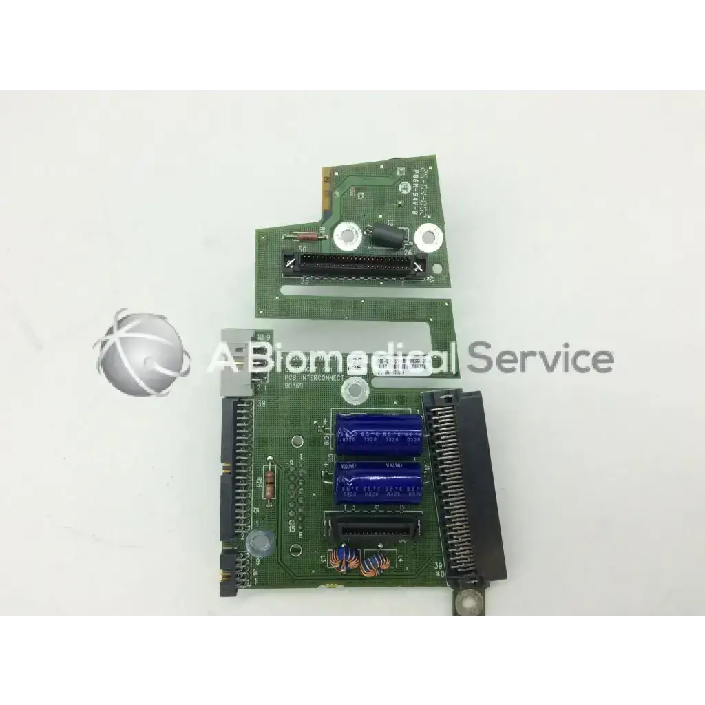 Green circuit board with blue capacitors and black connectors of spacelabs ultraview sl patient interconnect board pcb