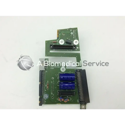 Green circuit board with blue capacitors and black connectors of spacelabs ultraview sl patient interconnect board pcb
