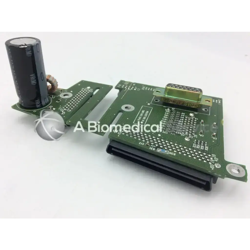 Green printed circuit board with black cylindrical capacitor and gold connector for spacelabs ultraview sl patient interconnect board pcb