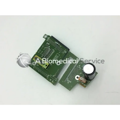 Green printed circuit board assembly with black and white capacitors gold-plated connectors and silver sphere for spacelabs ultraview sl patient interconnect board pcb