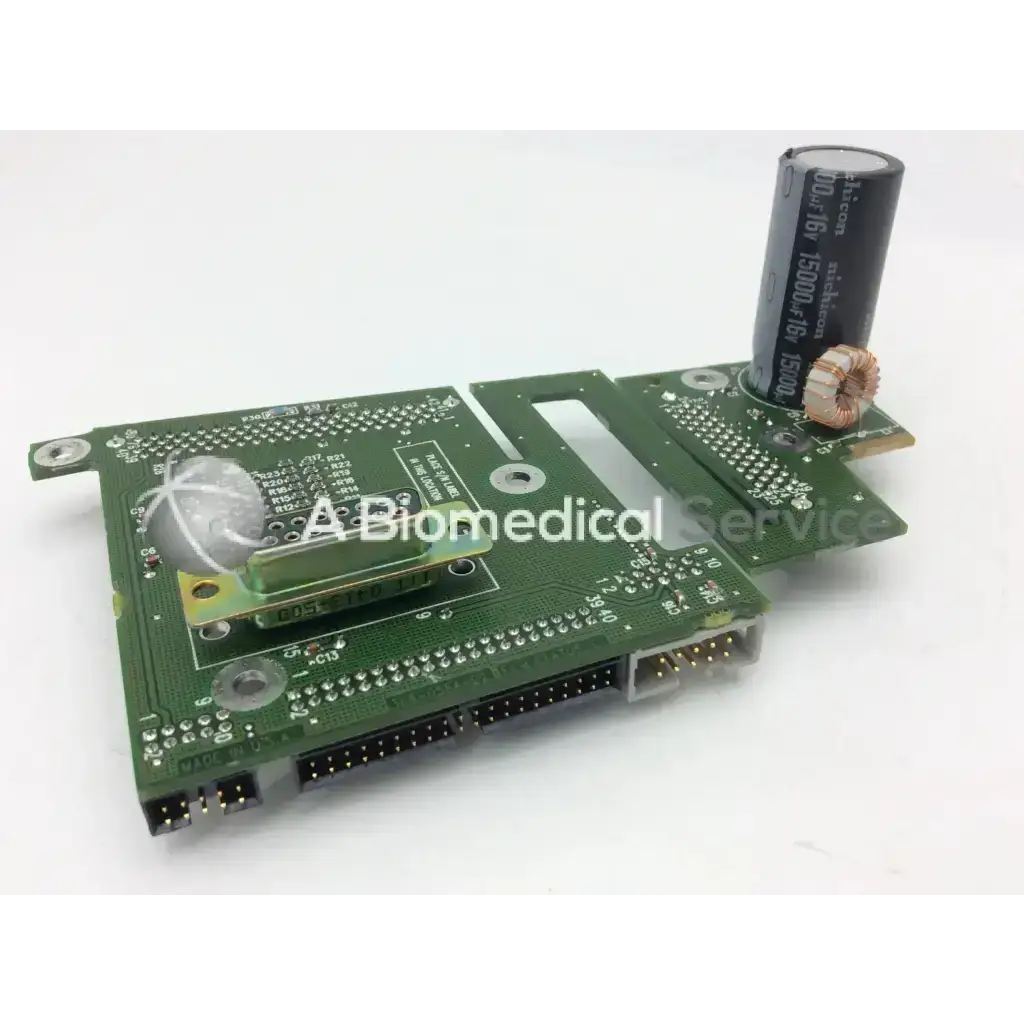 Green circuit board with black capacitor and components on spacelabs ultraview sl patient interconnect board pcb