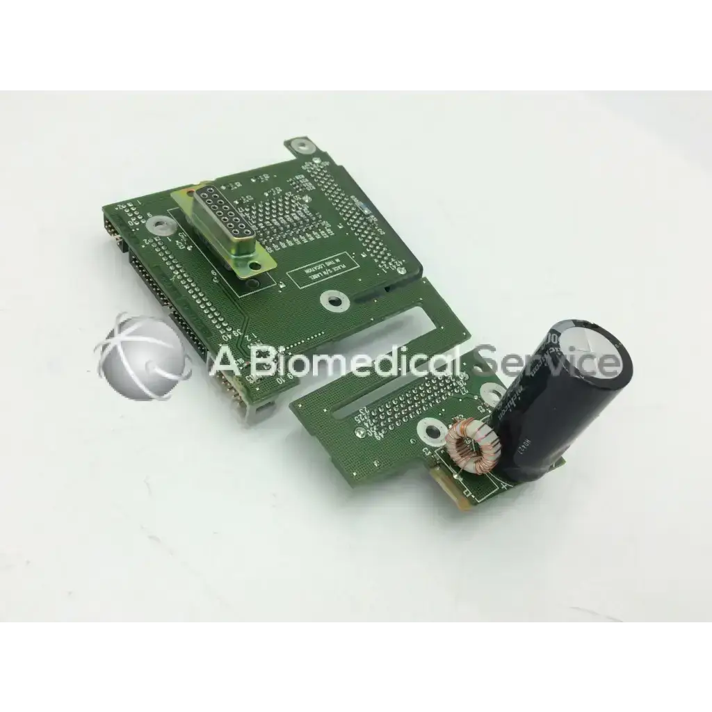 Green circuit board with black capacitor and metallic connectors of spacelabs ultraview sl patient interconnect board pcb