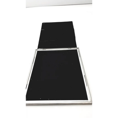 Silver-framed compact mirror with black mirrored surfaces and hinged design in spectroline 10x12 radiographic cassette style