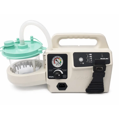 Beige and teal SSCOR II 2314B portable suction unit with clear collection chamber and control panel for medical use