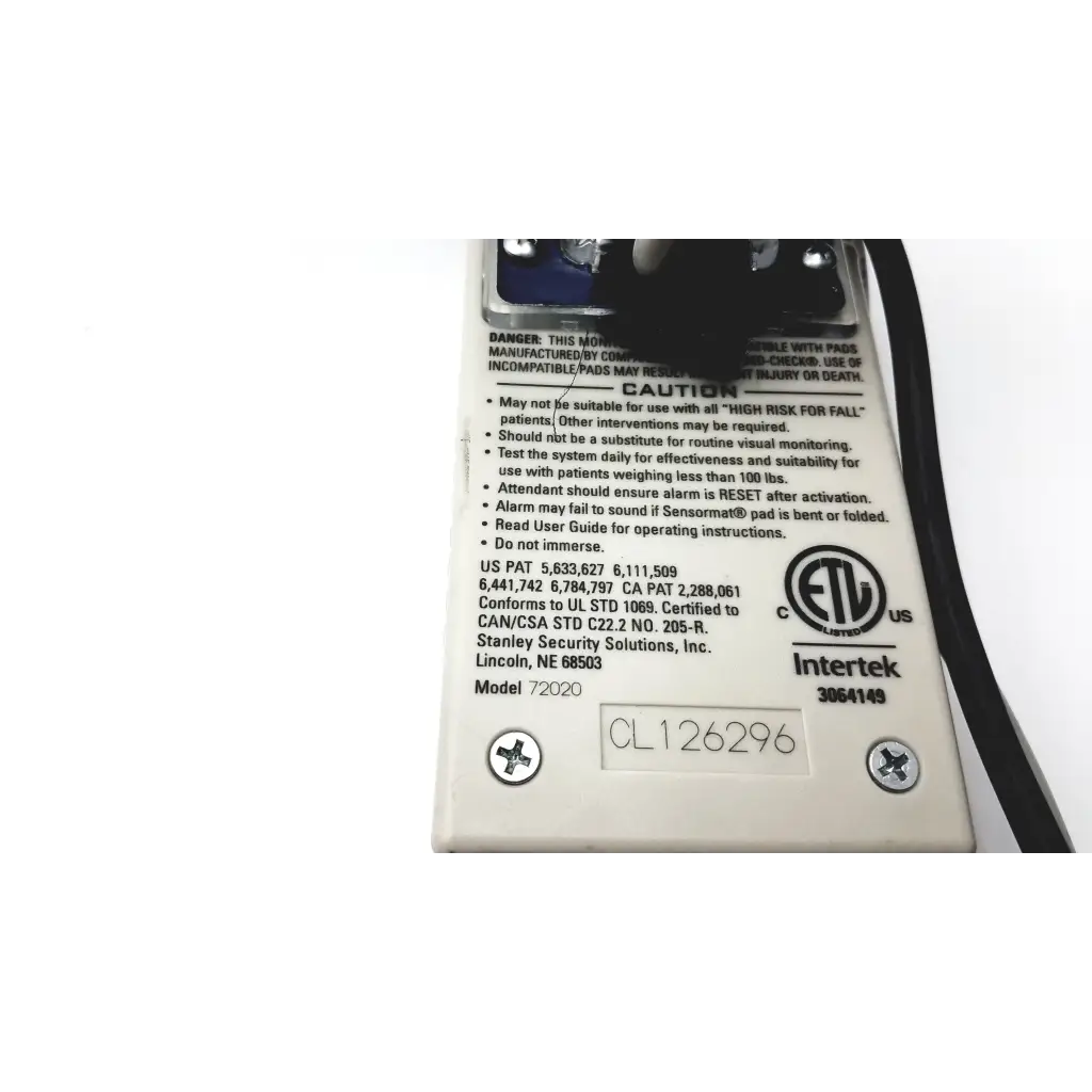 White rectangular medical alert device with black text and certification logos for stanley classic check 72020 model