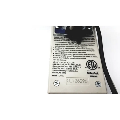 White rectangular medical alert device with black text and certification logos for stanley classic check 72020 model