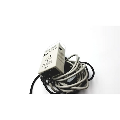 Beige plastic Stanley Classic-Check bed check device with coiled cables for fall risk monitoring and bed check