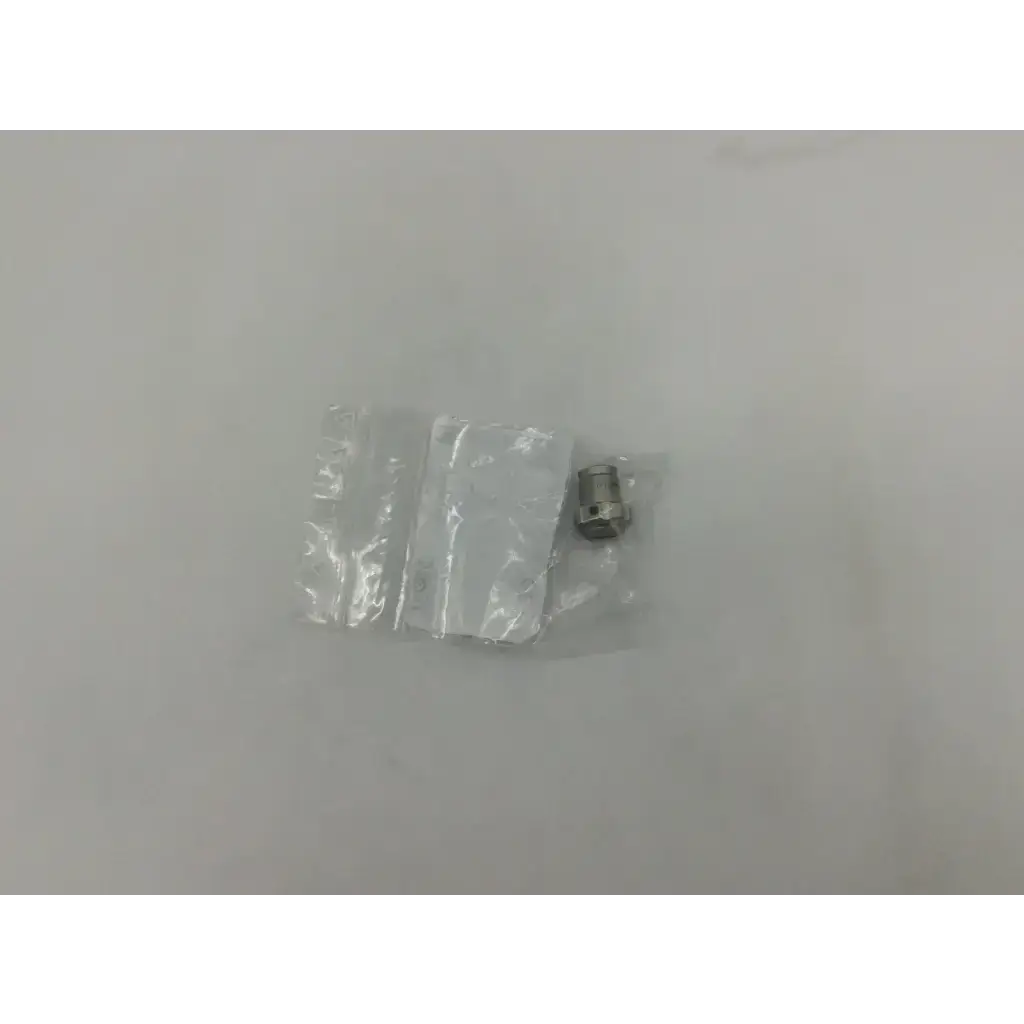 Silver metallic hexagonal bolt of storz 10315m glass window plug in clear plastic packaging