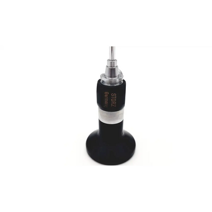 Black and silver storz 27020c hopkins cystoscope with cylindrical handle and metallic tip for surgical use