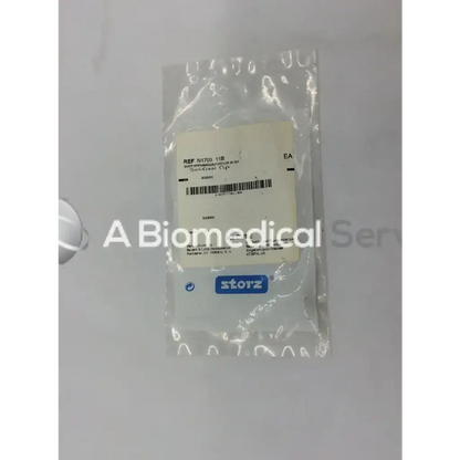 A sterile clear plastic package containing a storz n1703 11b suction tip made for surgical use