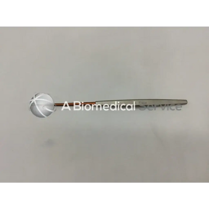 Silver storz n2350 curette surgical instrument with spherical crosshatched head and slender metallic handle