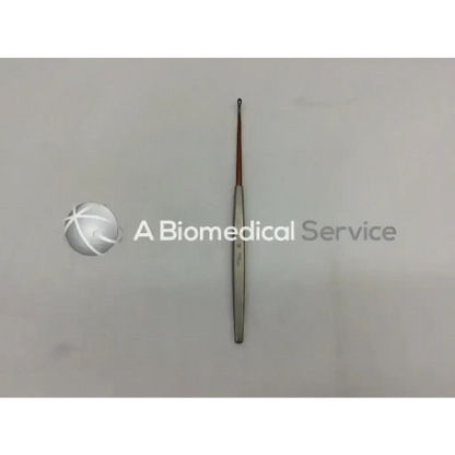 A sleek metallic storz n2350 curette with a slender handle and fine-tipped probe for precise medical use