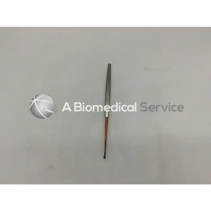 A sleek metallic storz n2350 curette with a slender handle and fine tip designed for precise surgical use