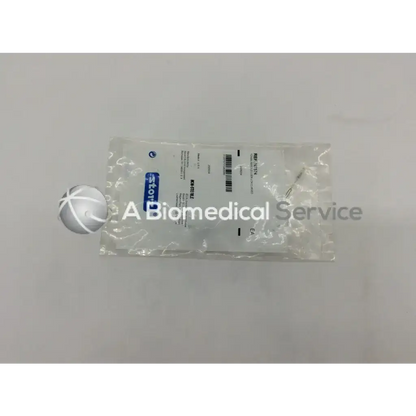 A clear plastic package containing a storz n7574 luer lock tonsil needle labeled with brand stryker and barcode