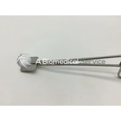 Silver storz surgical n1705 ent sheehy fascia press with spherical translucent handle and engraved cross pattern