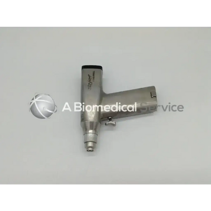 Silver stryker 2102 drill orthopedic trauma with black top and metallic handle for precise orthopedic trauma use