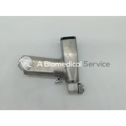 Silver metallic stryker 2108 system 2000 sag saw ortho handpiece with spherical knob and threaded connection points