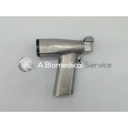Silver metallic stryker 2108 system 2000 sag saw ortho handpiece with textured grip and ergonomic handle
