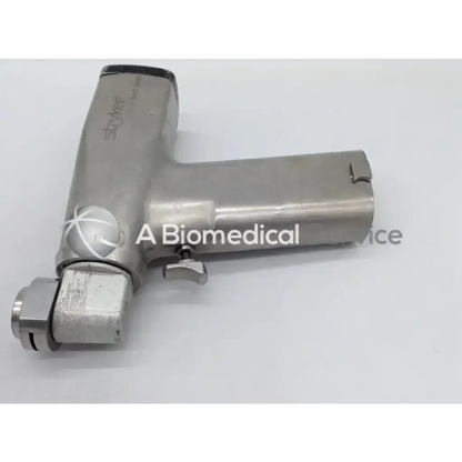 Silver metallic stryker 2108 system 2000 ortho handpiece with sleek ergonomic design and engraved branding