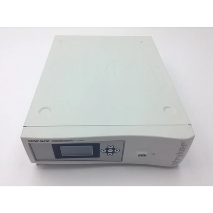White sirona suite integrated control unit with digital display and button panel for Stryker sidne suite control system