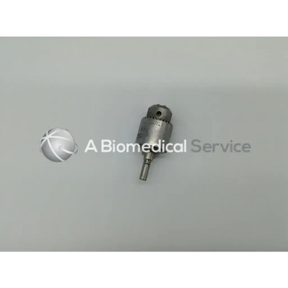 Silver metallic surgical key drill stem with jacobs chuck textured grip and engraved markings for stryker 277-82-131